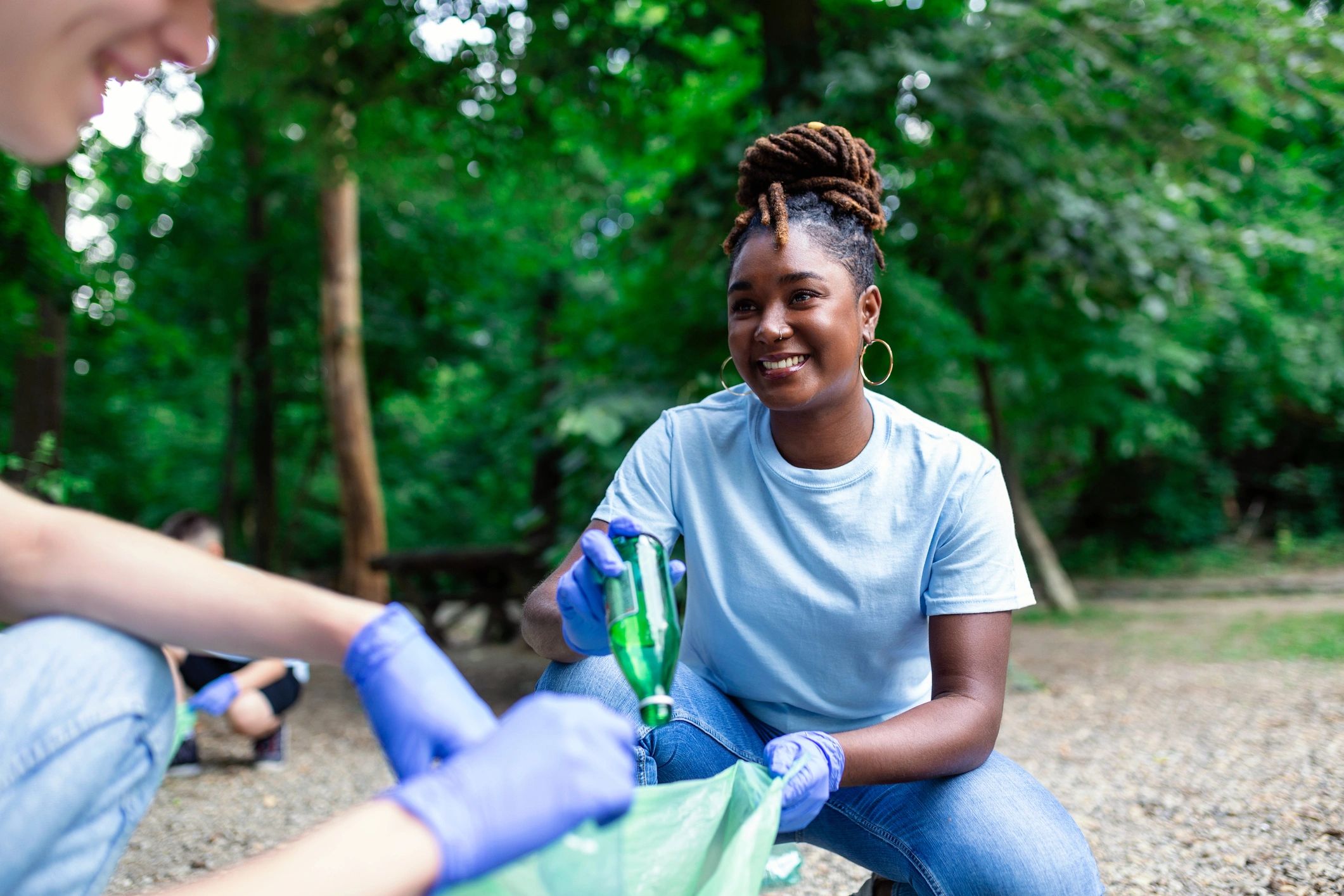 Group of volunteers cleaning together in a public park